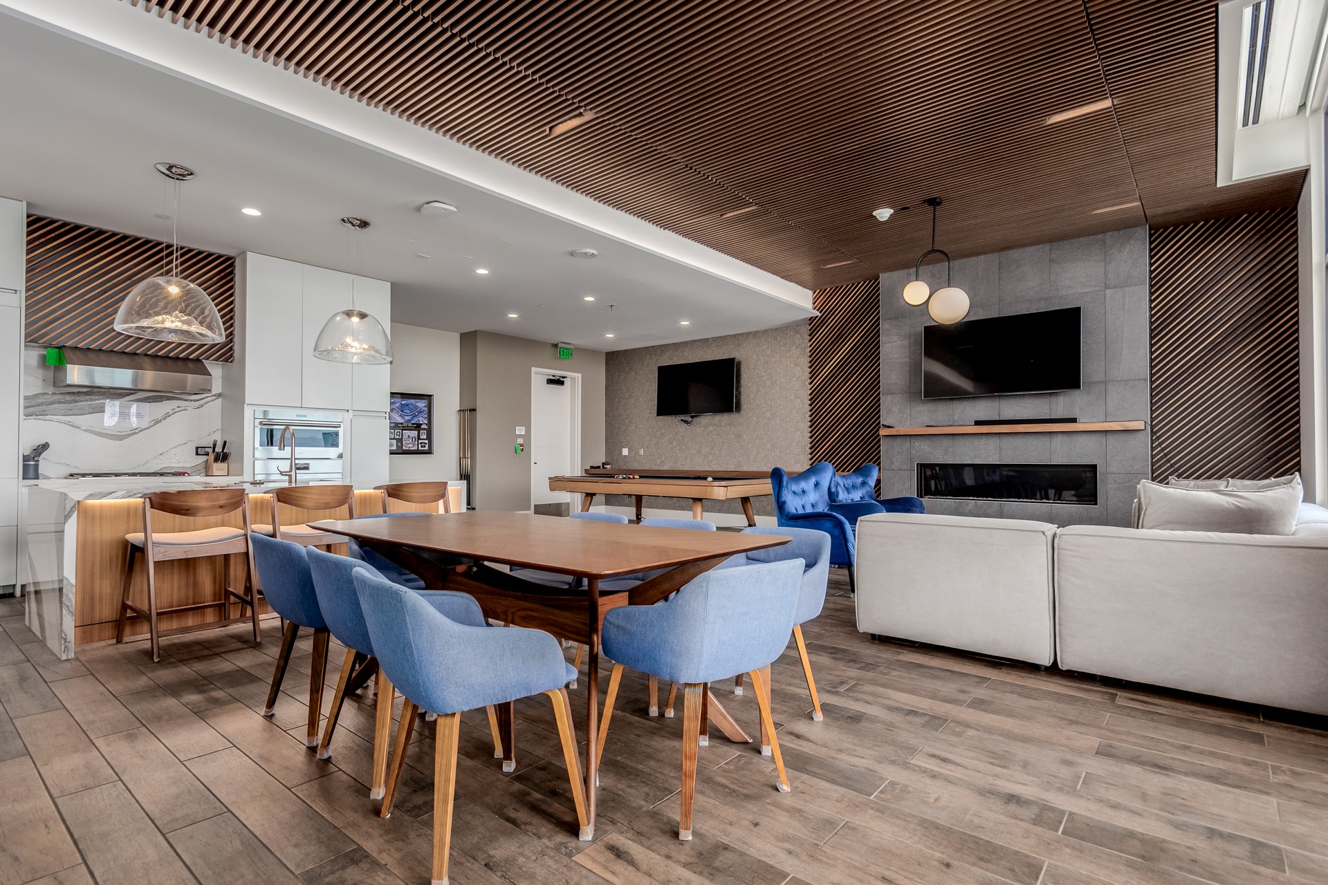 Upstairs community room with dining, kitchen and gathering areas