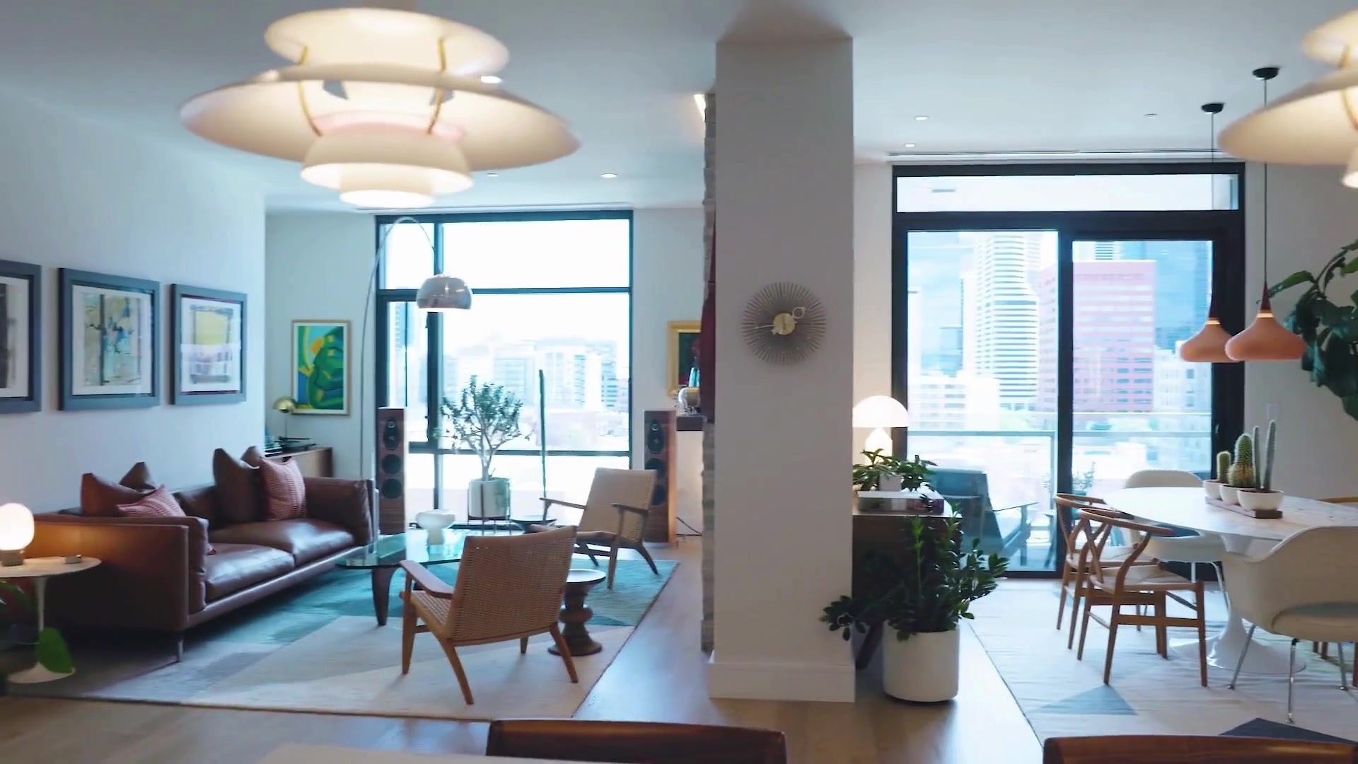 Open living and dining spaces inside McGregor Square Residence 1007